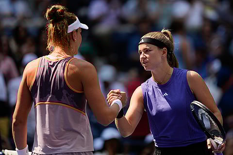 US Open tennis 2024: Karolina Muchova, of the Czech Republic, shakes hands with Beatriz Haddad Maia, of Brazil